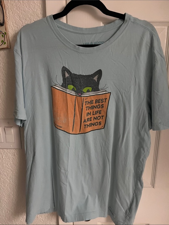 Life Is Good Tops - Life Is Good Light Blue Tee with Black Cat and Orange Book Graphic